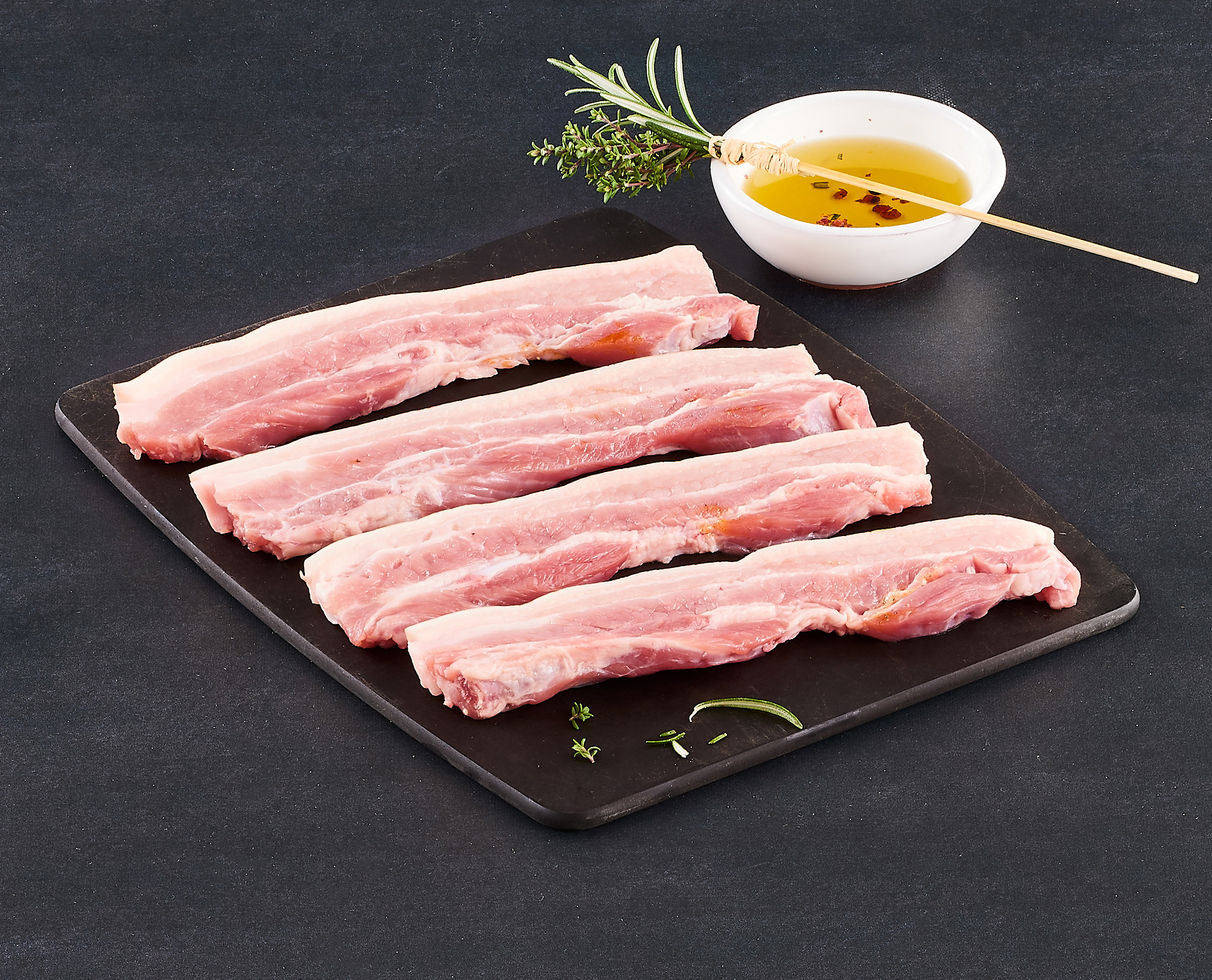 PORC TRANCHE DE POITRINE SANS OS NATURE OU MARINADE CURRY